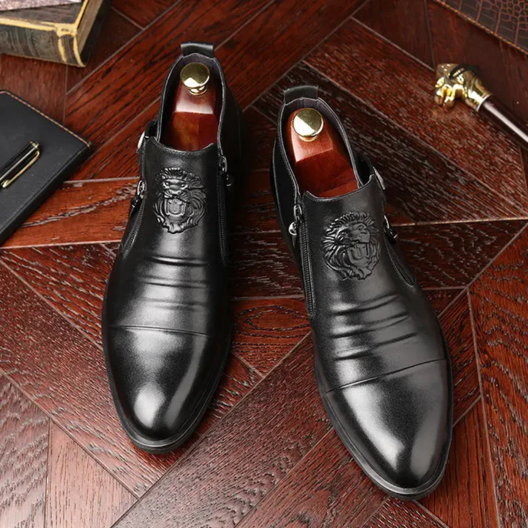 Botines de cuero negra con cremallera lateral para un look atrevido y sofisticado