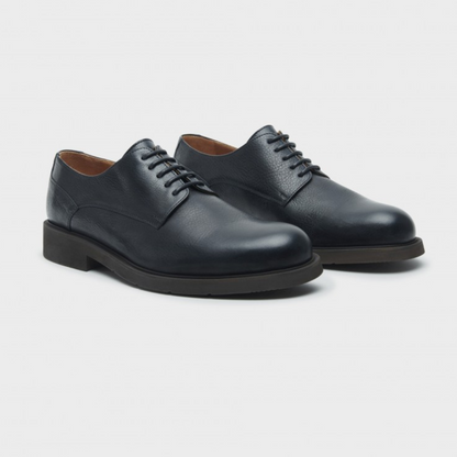 Zapatos de piel con suela resistente y acabado elegante para hombre®